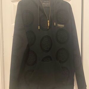 Black Medallion Graphic Hoodie with Gold Accents